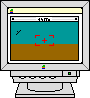 A computer monitor displays a game with blue water, brown ground, and red targeting reticles; explosions occur as objects move across the screen.