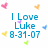 Pixelated blue text reads "I Love Luke 8-31-07" surrounded by small colored heart shapes on a white background.