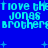 Blue background with repeated cyan text 'I love the jonas brothers' and small white plus signs scattered throughout.