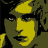Pixelated image with two yellow-toned faces and a dragonfly symbol on black background.