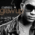 Black-and-white pixelated image of a person with long hair and sunglasses, partially overlaid by brown text reading "gevup".