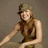 Pixelated image of a woman in a sleeveless dress and cap, with text reading "Kelly Clarkson Rocks" and "I Love You Kelly" on dark blue backgrounds