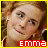 A pixelated image of a person with light brown hair and fair skin, smiling slightly, framed by colored borders.