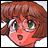 Pixelated anime-style character with brown hair and green eyes, mouth open in surprise, next to black background with white text.