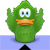 Green pixelated duck-like character with large blue eyes and orange beak, arms raised, standing on black base against gray and blue background.