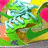 Pixelated static image with vibrant green, blue, yellow, pink, and brown hues forming abstract shapes against a multicolored background.