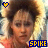 Animated sequence of a person with curly brown hair and light skin wearing an orange top, surrounded by yellow sparkles, with blue 'SPIKE' text below.