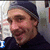 A person wearing a dark beanie and dark shirt appears in three with changing text overlays: 'I', 'Love', and 'Josh' in blue pixelated font