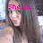 A pixelated image of a woman with long brown hair wearing a sleeveless top, with pink text overlays changing across frames.
