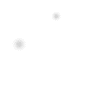 A white background with scattered gray dots of varying sizes, some appearing blurred or faded.