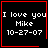 Four identical black square with red borders display white text reading "I love you Mike 10-27-07"; two have small red symbols in the bottom-right corner
