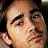 A 48x48 pixel buddy icon featuring a close-up of a person's face on the left and text reading "i love Colin Farrell" in black block letters on the right against a white background.