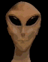 Six pixelated alien head views arranged in two against black backgrounds, showing varied facial expressions and eye positions