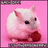 Pixelated pink background features a white hamster holding a red heart, with black eyes and pink inner ears.