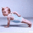 A child in a light blue outfit performs a plank pose, transitioning from left to right across four
