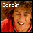 nine pixelated images showing a person with curly brown hair in a red shirt, each displaying variations in text and small symbols above the head