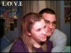 A static image shows two people in close proximity, with the word LOVE in white text at the top left corner.