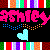 Pixelated graphic with pink text 'Stacey' over black background, blue and orange pixel dots forming a heart shape below the text.