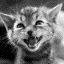 Black-and-white pixelated image of a cat's face with squinted eyes and an open mouth showing teeth, appearing to smile or laugh in a cartoonish style.