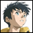 Pixelated anime-style character with dark spiky hair and teal eyes, wearing a yellow garment, next to black background with white text.