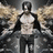 A pixelated image of a winged figure with outstretched arms, surrounded by red text questioning the identity of Criss Angel.