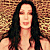A split-screen image shows a woman with long dark hair on the left and a blue-toned figure in white light on the right against pixelated backgrounds.