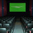 A pixelated green rectangle dominates the upper center, framed by dark borders with red and blue vertical stripes on the sides, over a blurred lower section of gray and teal pixels.