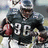 Pixelated image of a football player in dark jersey with number 36 holding a ball, surrounded by green text reading WILL HE GO ALL THE WAY.