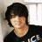 A 4-frame contact sheet of a young man with dark hair in various poses and outfits against different backgrounds, displayed as an animated AIM buddy icon.