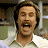 Pixelated image of a person with brown hair and light skin wearing a white collared shirt, next to blue background text reading 'THE LEGEND OF RON BURGUNDY' in blocky letters.