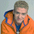 A split-frame contact sheet showing a person in an orange jacket on the left and green text reading "Original Icons .com" on the right against a dark background.