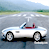Animated contact sheet showing three frames of a white convertible car on a road with red interior, displayed alongside Coolbuddy.com text.