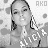Pixelated grayscale image of a person with long hair, closed eyes, and a neutral expression, with partial text 'AKO' visible in the upper right corner.