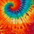 A pixelated tie-dye pattern with swirling orange, red, blue, and green hues; the word "tada" appears in bold white letters on a black outline.