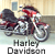 A 50x50 pixel animated buddy icon featuring a red and black motorcycle with visible text "Harley Davidson" below it, displayed in a contact sheet layout with two frames showing slight motion differences.