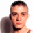 A 48x48 pixel buddy icon split into two frames showing a person's face on the left and green text logo on the right against dark background.