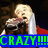 Pixelated image of a person with light hair holding another figure, overlaid by bright green text on blue background.