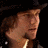 A pixelated image of a person in profile wearing a dark hat and jacket, with pink text reading 'i love bdm' overlaid on the lower portion.