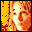 Pixelated cartoon-style icon with yellow and red background, showing a person's face in with text overlays