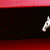 A white horse gallops left to right against a black background with red horizontal bands, rendered in pixelated style.
