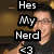 A person in a black shirt gives a thumbs-up gesture with a smile, with text overlay reading "Hes My Nerd <3" in the top-left