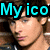 A pixelated image of a person with brown hair and light skin, featuring text overlays in cyan and red.