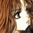 A 48x48 pixel buddy icon featuring a close-up of a character's face with long brown hair and a black background containing white text elements.