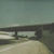 A static image of a highway scene with text overlays changing across six