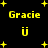 Yellow pixelated text and symbols on black background with animated star-like sparkles.
