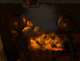 Animated sequence showing a dark background with circular metallic objects and shifting orange-yellow flame-like patterns