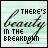 A 48x48 pixel animated buddy icon with a light green striped background, displaying the text "THERE'S BEAUTY IN THE BREAKDOWN" in black block letters and cursive script, transitioning between two states where the cursive text changes color from dark gray to bright green.