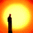 Animated sequence showing silhouettes of figures against a bright yellow-orange background with 'Dawn of the Dead' text appearing in