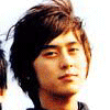 Four distinct headshots of young East Asian men arranged in a , with text labels on the right side