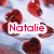 Animated icon with red hearts on light blue background, displaying sequential text: 'Natalie', 'I <3 u!', 'Friends forever!', and 'I'll never forget you'.